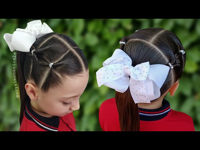Niñas felices con peinados creativos, listas para el regreso a clases.