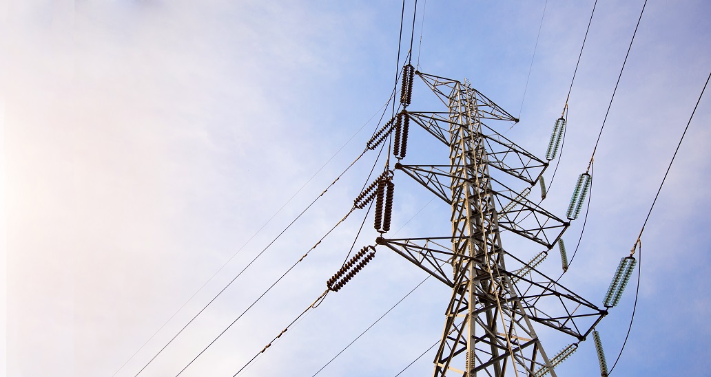 High Voltage Power Line on sky in morning light