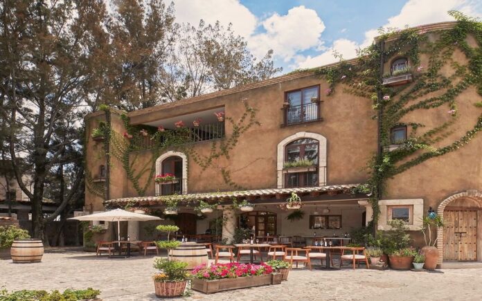 Terraza de un restaurante en Val'Quirico con música en vivo y ambiente europeo.