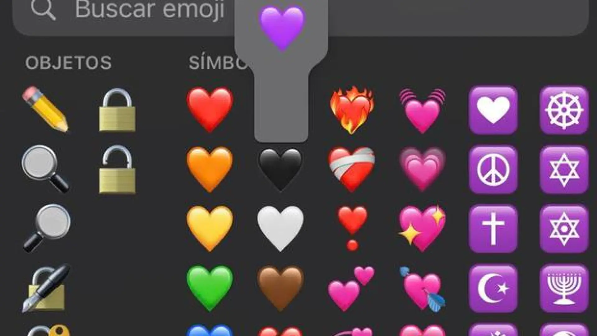 Todos los emojis de corazón de WhatsApp en una cuadrícula mostrando rojo rosa naranja amarillo verde azul morado negro y blanco con el negro resaltado