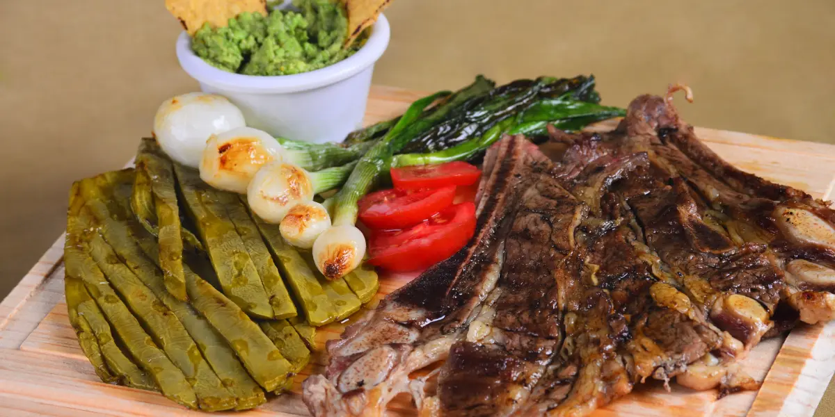 La Carne Asada: Más que una Comida, un Ritual Social